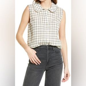 Sleeveless button up with a Peter Pan collar
